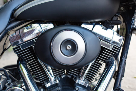 Close up of Vintage motorcycle parking on the road. Croped view