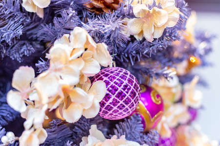 Closeup on Christmas tree decoration over festive backgroundの写真素材