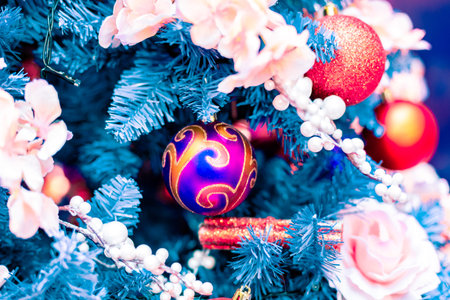 Closeup on Christmas tree decoration over festive background