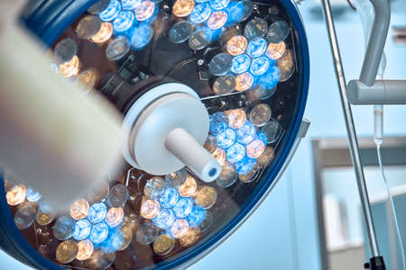 surgical lamp in operation room take with art lighting and blue filterの写真素材
