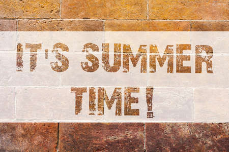 Text sign showing It S Summer Time. Conceptual photo Relax sunny hot season of the year Vacation beach trip Brick Wall art like Graffiti motivational call written on the wallの写真素材
