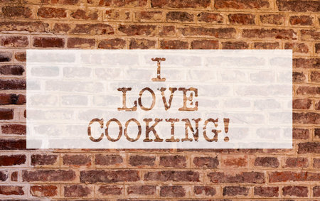 Conceptual hand writing showing I Love Cooking. Business photo showcasing Having affection for culinary arts prepare foods and desserts Brick Wall art like Graffiti motivational written on wallの写真素材