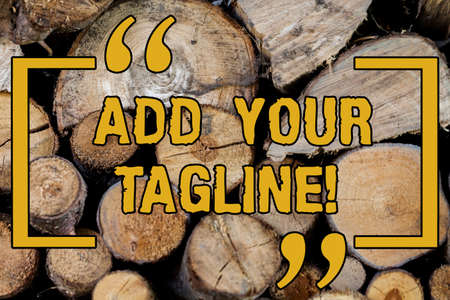 Handwriting text writing Add Your Tagline. Concept meaning slogan used in marketing materials and advertising Wooden background vintage wood wild message ideas intentions thoughtsの写真素材