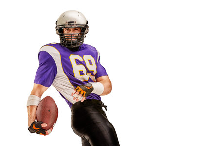 Football Player in action with ball in the hand isolated on white background.
