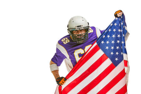american Football Player with uniform and american flag proud of his country, on a white background.の写真素材