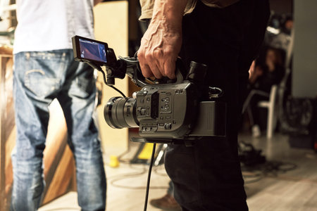 The team of the director, videodeoperators and actors works on the site. Video production,...