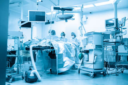 Intensive care, saving the patient s life. Doctors do everything possible to save a person from pneumonia of the virus covid 19. Epidemic, blue filterの写真素材