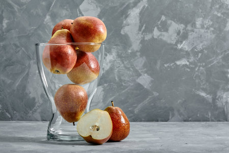 Group of ripe juicy pears on concrete surface