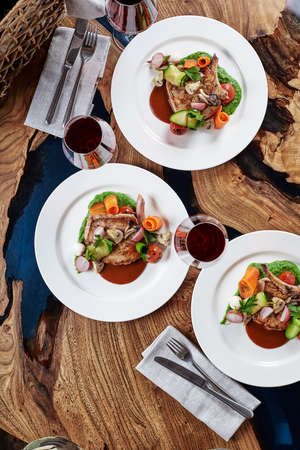 Steak on the bone. tomahawk steak On a white background. Top view. Free copy space.の写真素材
