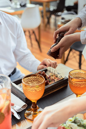 couple having amazing lunch at outdoor restaurant