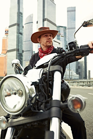 Baking pan with uncooked beef roulades and fresh vegetable trimmings ready for cooking on a white backgroundの写真素材