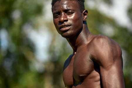 Portrait of topless afcan sportsman ready to training.の写真素材