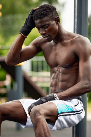 Portrait of topless african sportsman ready to training.の写真素材