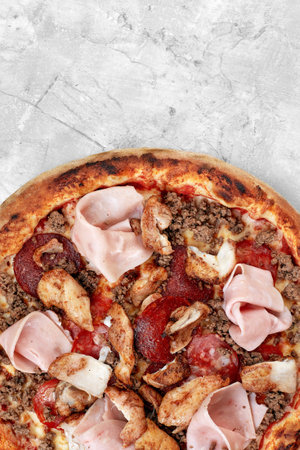 Meat Italian pizza with roast beef, steak slices, melted cheese, with olive slices and cheddar cheese. Close up, macro. Pizza time concept.の写真素材