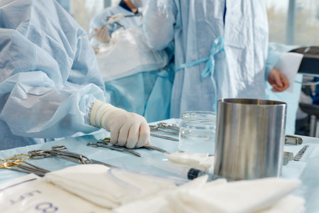 Surgical instruments in operating room on table.