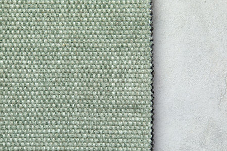 Masterly fabric background in new olive colour. Seamless square texture, tile ready