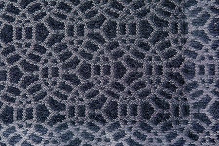 Abstract circular print background on cotton fabric in gray tone