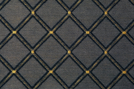 yellow-black fabric with rhombuses background for design