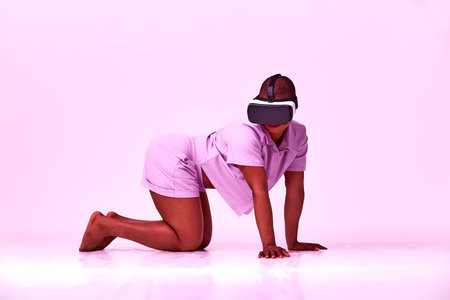 A cheerful girl in virtual reality glasses. Blue and purple colors.