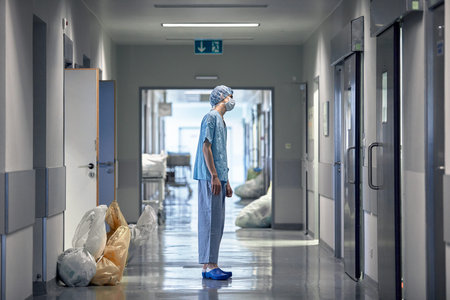Male surgeon looking at sadness, fatigue after surgery, stress, depression, guilt, unhappy problem,...