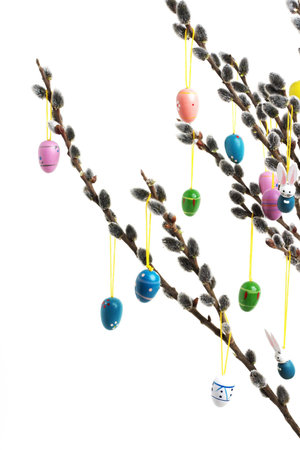 Easter eggs hanging from willow branches
