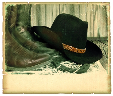 Vintage western background with cowboy hat on old paper for textの写真素材