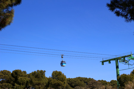 Cable cabin in blue skyの写真素材