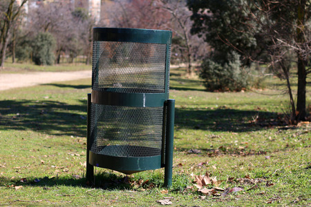 Green Garbage Can in Parkの写真素材