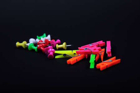 Group of desk utensils with black background.の写真素材