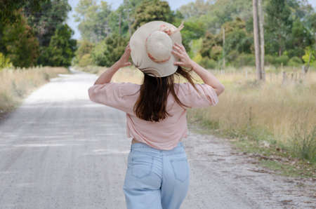 girl's walking free in the summerの写真素材