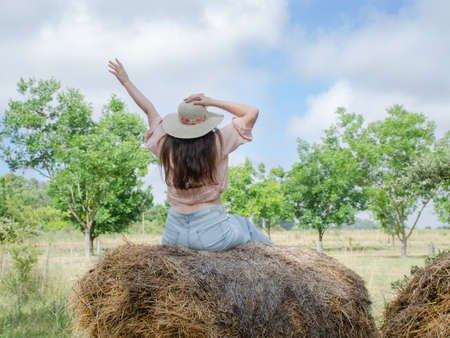 girl in a hat. Girl portrait in the farmの写真素材