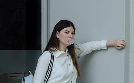 girl's playing with bubble gum. urban picture and lifestyle
