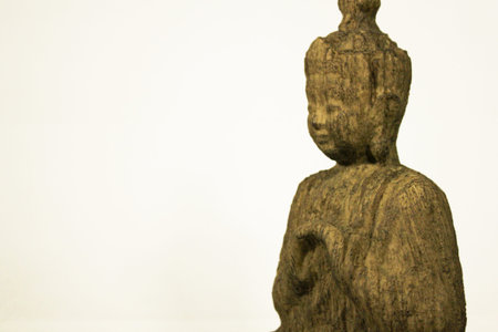 Buddha statue made of wood white background