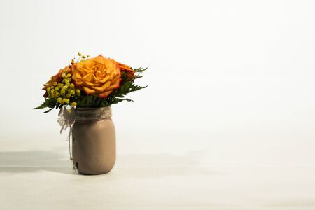 Yellow rose flowers arrangement isolated on whiteの写真素材