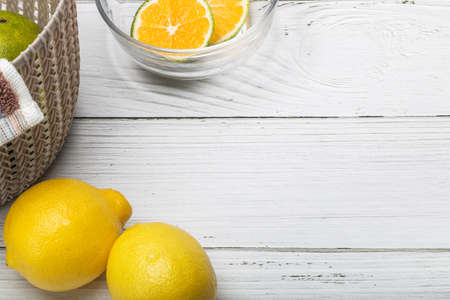 Oranges, lemons and watermelon on wooden tableの写真素材