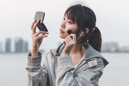 Girl with makeup at the seasideの写真素材