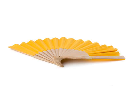 Yellow Open Hand Fan Isolated on a White Background. Studio shot. Focus stacking.の写真素材