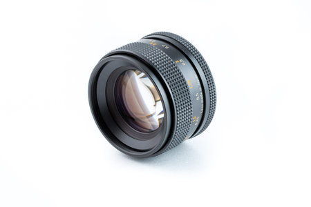 Close up of vintage camera lens on a white background. Studio Shot