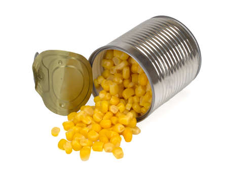 sweet corn sprinkled from a metal can isolated on a white background, Top viewの写真素材