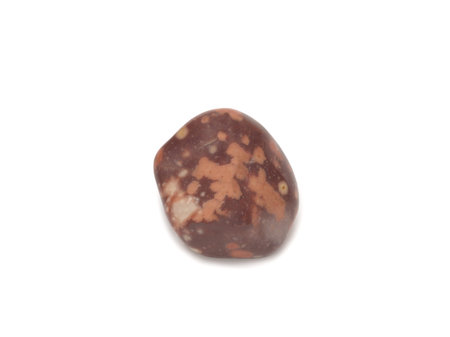 closeup of sample of natural mineral from geological collection - jasper gem stone isolated on white...