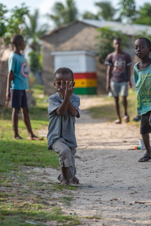 Ghana children happily posing in front of the camera, the picture was taken in Keta Ghana West Africa 2020 November 12のeditorial素材