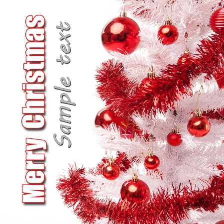 White christmas tree with red ornamentsの写真素材