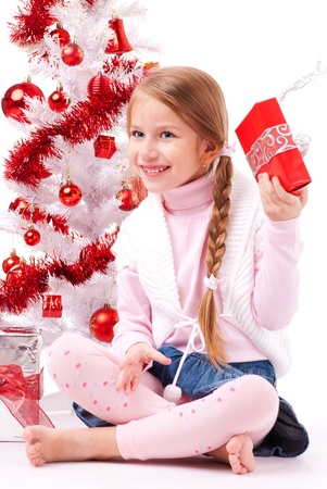 Girl shows her giftの写真素材