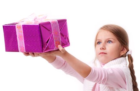 Girl gives a gift box の写真素材