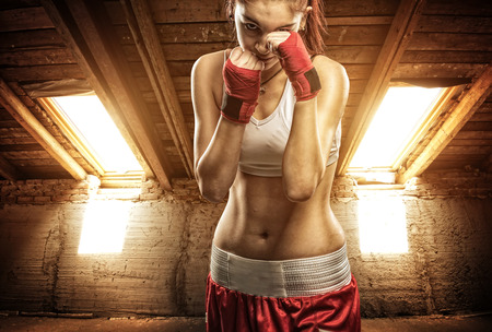 Young women boxing, exercise in the atticの写真素材