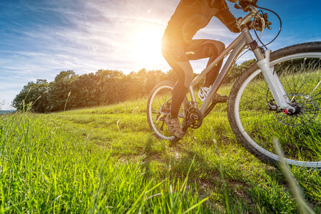 Sport bike, cycling in the beautiful meadow, detail photo,の写真素材