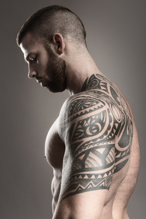 muscular tattooed manの写真素材