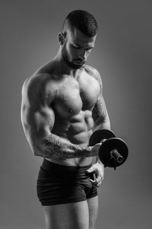 Muscular man - half-length, black and white photoの写真素材
