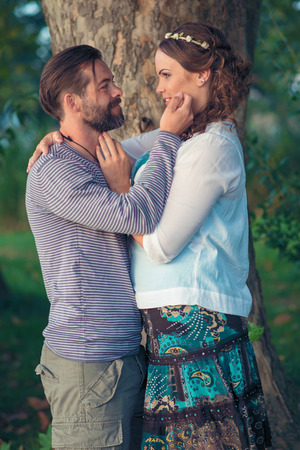 Happy couple have fun outdoor in the parkの写真素材