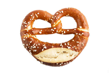 Bavarian Pretzel, baked bread isolated on white backgroundの写真素材